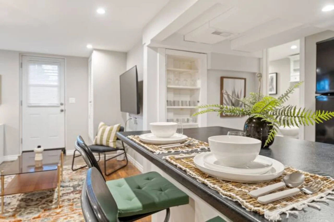 The dining area invites you to savor every moment, whether enjoying a quiet meal or hosting a festive gathering.