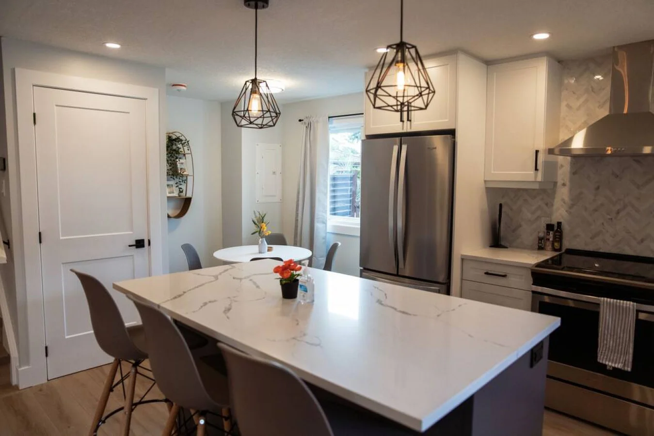 The dining room invites you to savor every moment, whether enjoying a quiet meal or hosting a festive gathering.