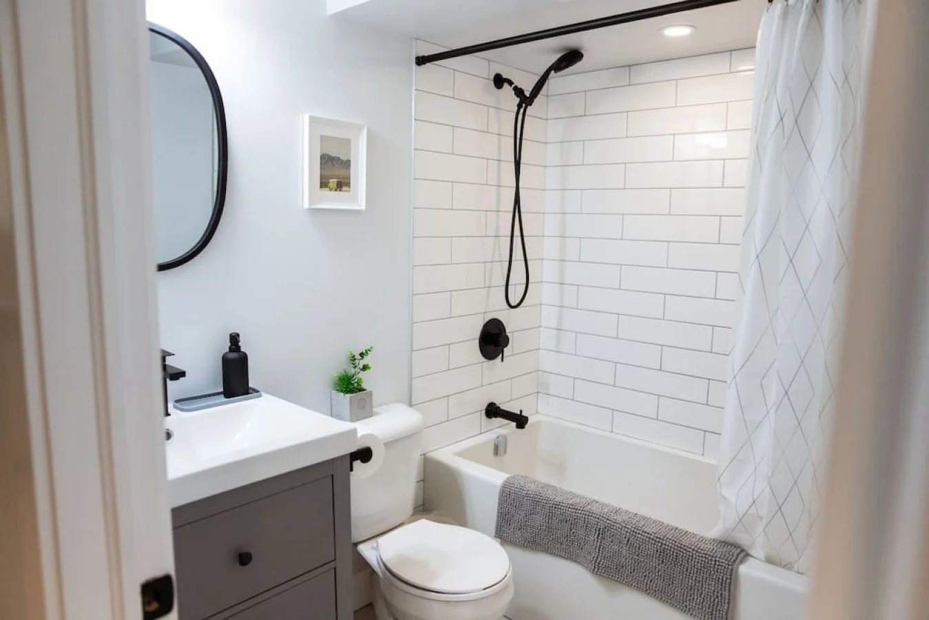 You feel a sense of calm as you enter the bathroom, where the thoughtful design and high-quality materials create a serene environment.