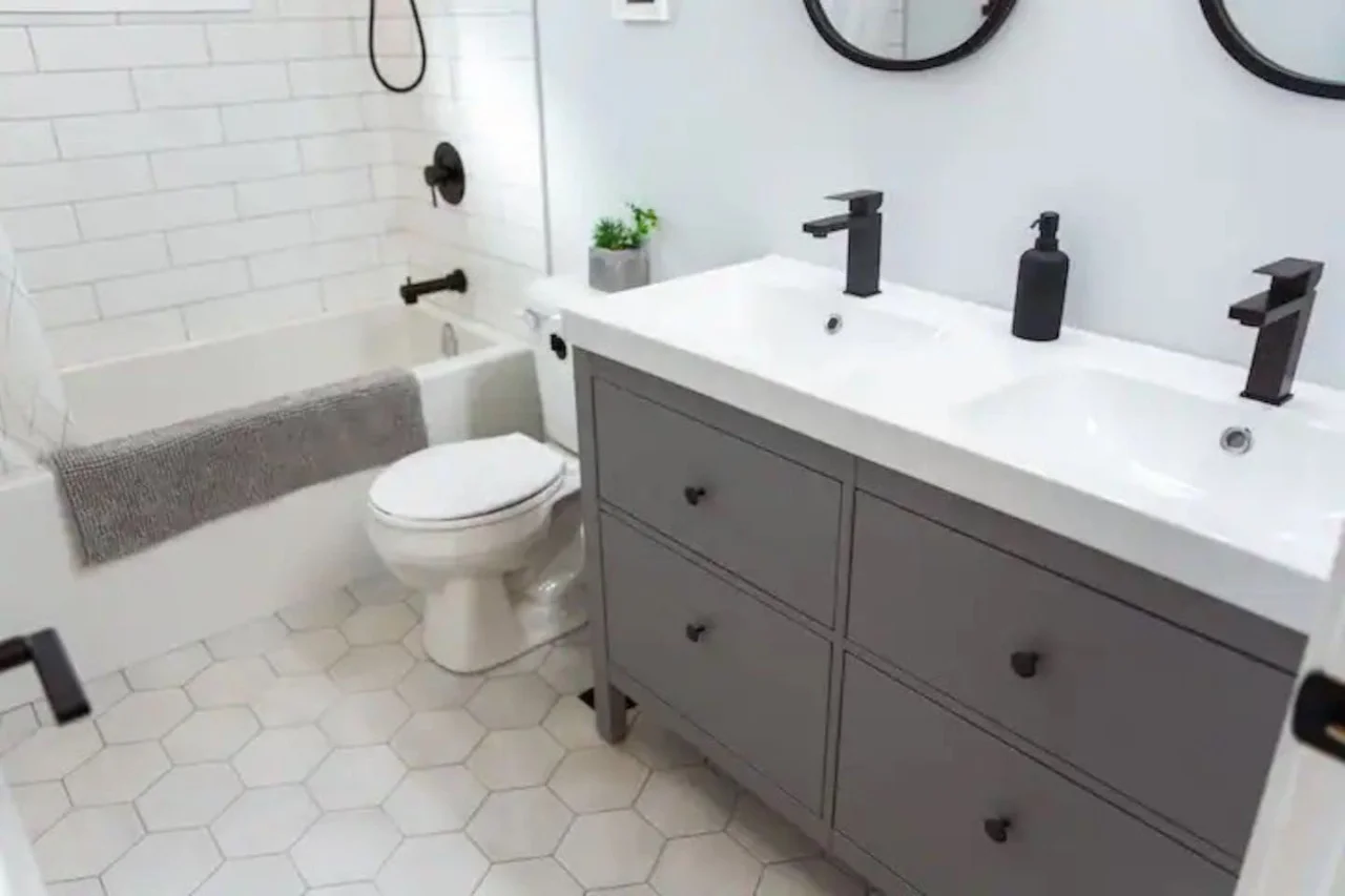 As you step into the bathroom, the clean lines and soothing colors create a space where you can relax and refresh.