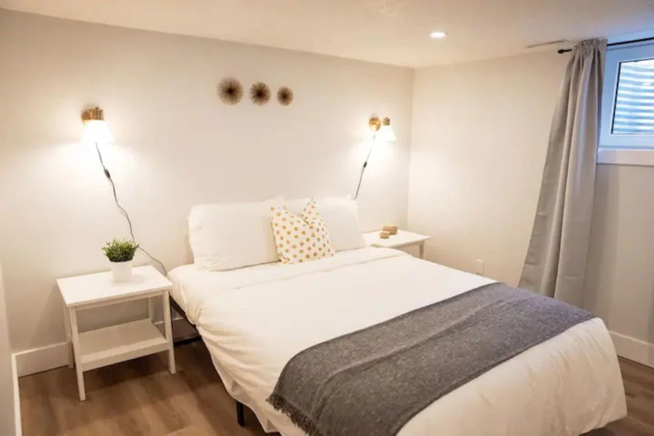 Spacious bedroom with stylish decor, perfect for unwinding after a day of exploring the local area.