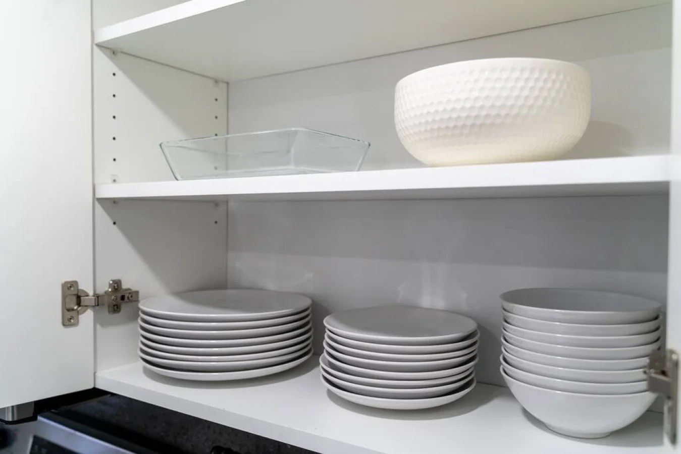 kitchen amenities with plates and bowls