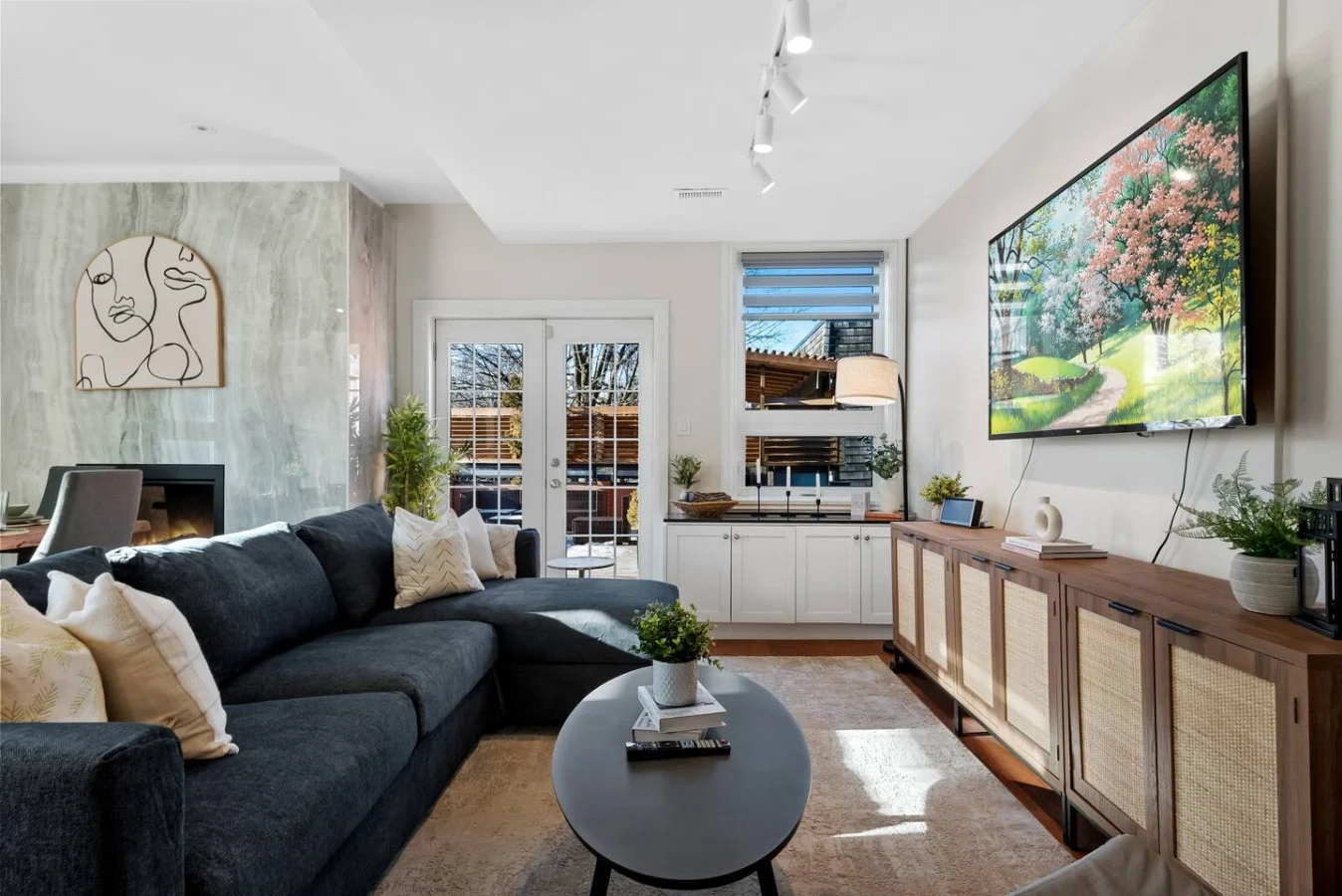 As you take a seat in the living room, the comfortable furniture and tasteful design make it easy to unwind.