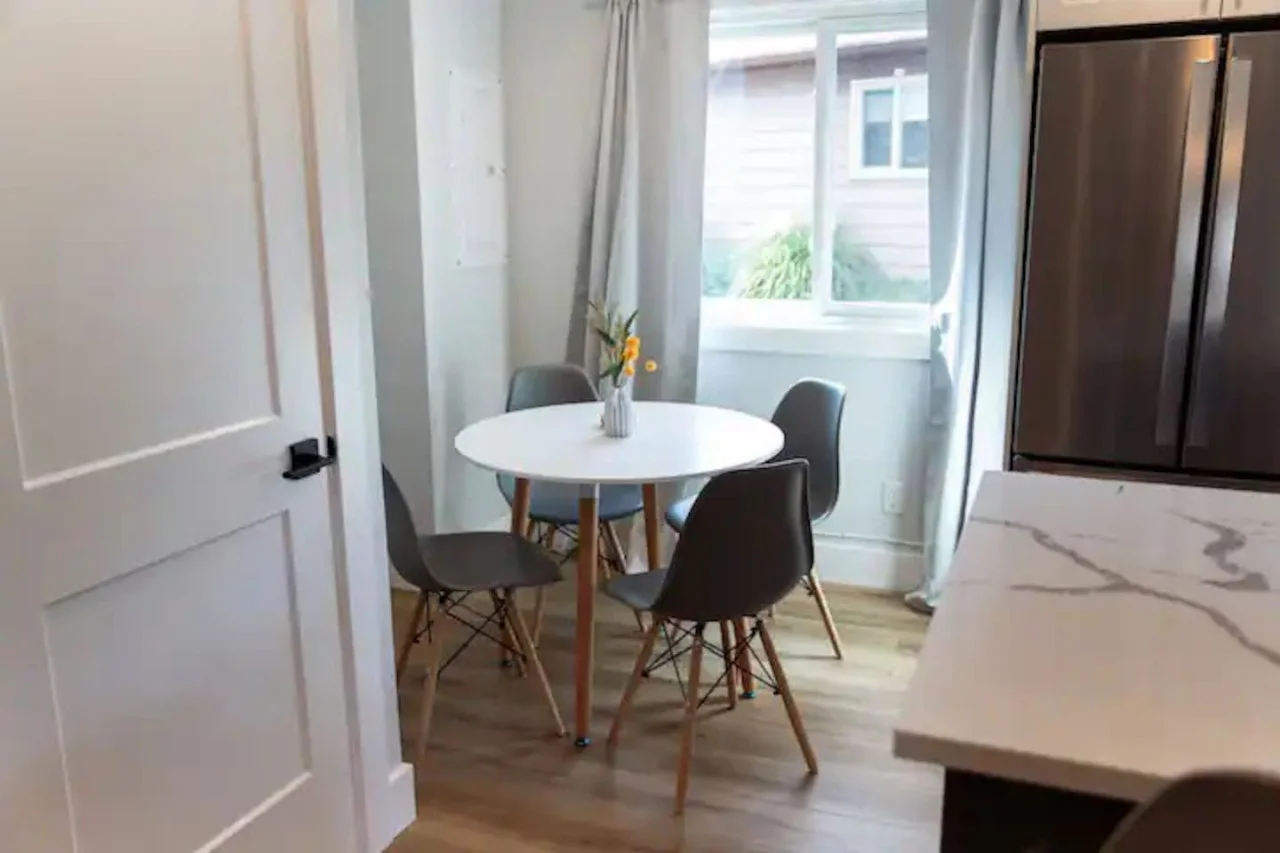 The dining area invites you to savor every moment, whether enjoying a quiet meal or hosting a festive gathering.