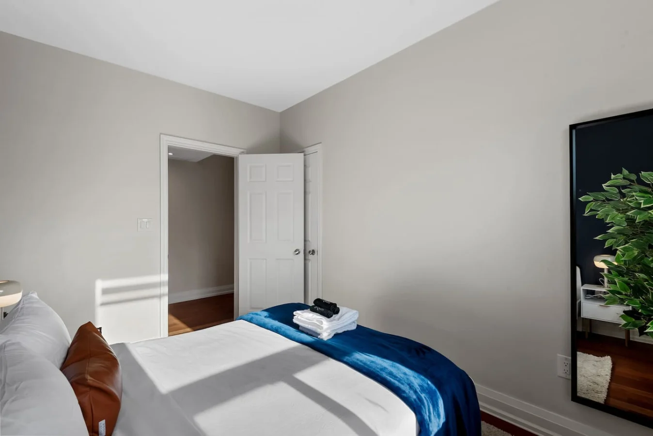 Spacious bedroom with stylish decor, perfect for unwinding after a day of exploring the local area.