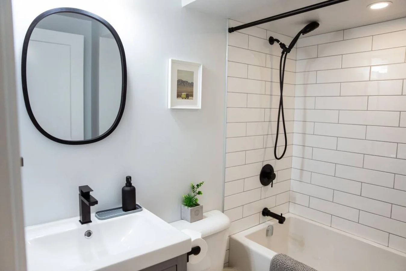 You feel a sense of calm as you enter the bathroom, where the thoughtful design and high-quality materials create a serene environment.