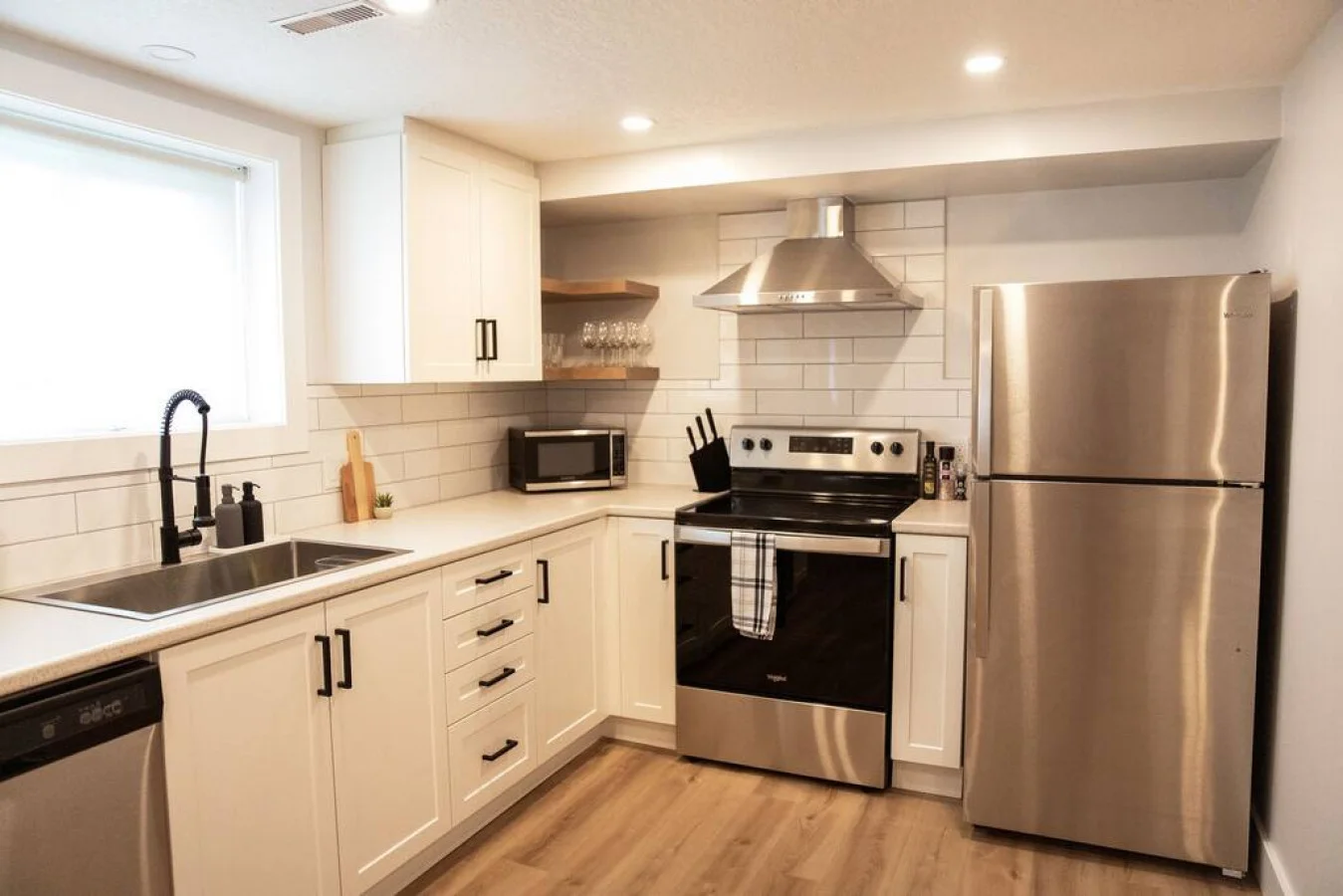 As you open the kitchen, you discover an assortment of coffee pods, and sugar, ensuring you have everything you need for a perfect morning or afternoon pick-me-up.
