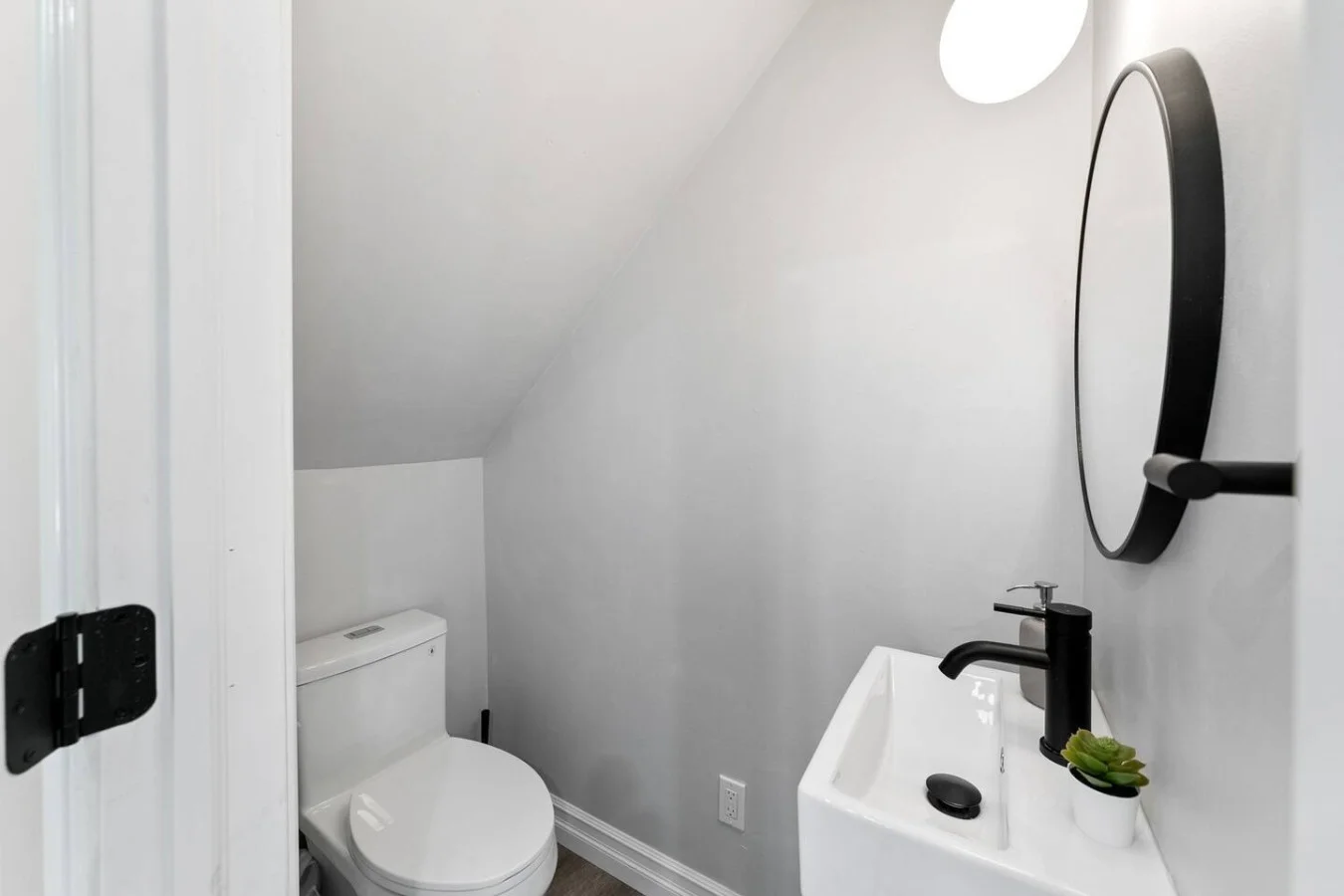 As you step into the bathroom, the clean lines and soothing colors create a space where you can relax and refresh.