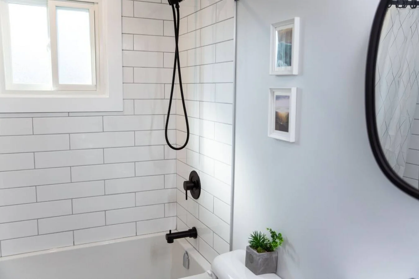 You feel a sense of calm as you enter the bathroom, where the thoughtful design and high-quality materials create a serene environment.