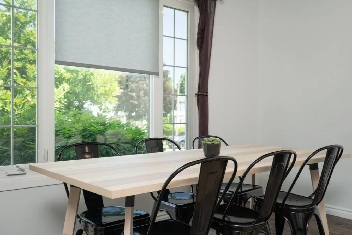 The dining area encourages you to gather with friends, enjoy a drink, and create lasting memories.