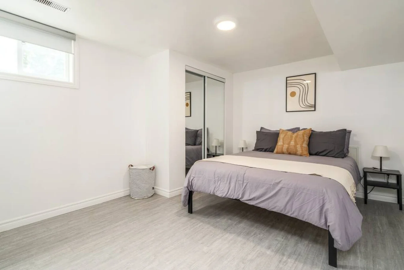 Cute spacious bedroom with queen bed that sleeps 2. Memory foam mattress with comfort in mindCozy bedroom with nightstands and blinds