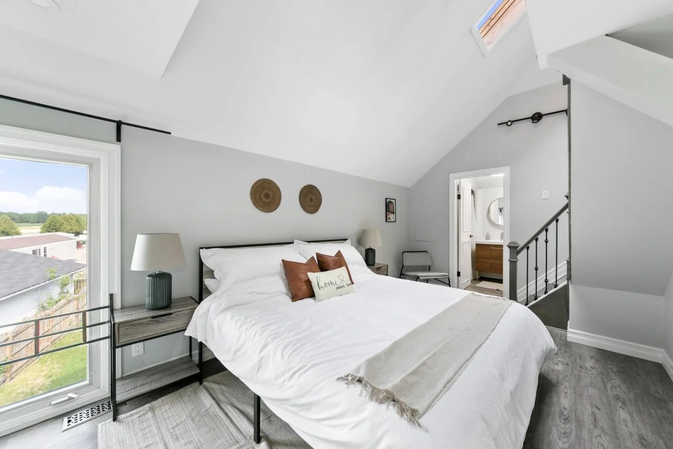 You’ll feel enveloped in warmth in this charming room with its rich wood accents and inviting bed. Wake up refreshed, surrounded by rustic coziness, and enjoy the perfect mix of comfort and natural vibes