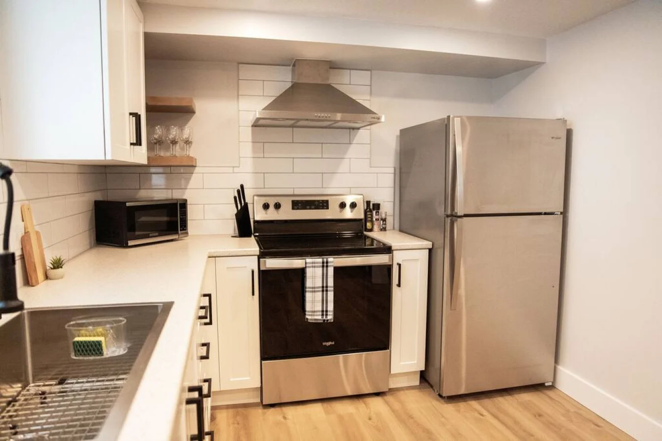 As you step into the kitchen, the clean lines and functional design make you eager to start cooking your favorite dishes.