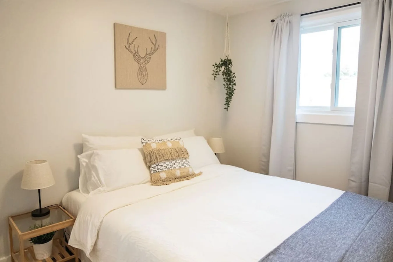 The queen bedroom’s stylish design and comfortable bedding create a perfect sanctuary for restful nights.