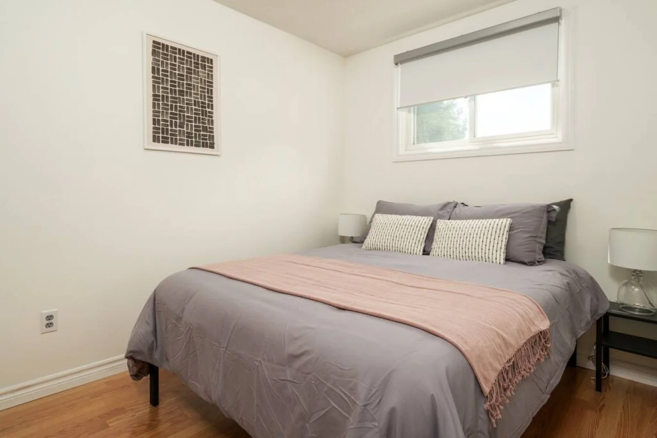 Cute spacious bedroom with queen bed that sleeps 2. Memory foam mattress with comfort in mindCozy bedroom with nightstands and blindsComfortable pillows with new sheets