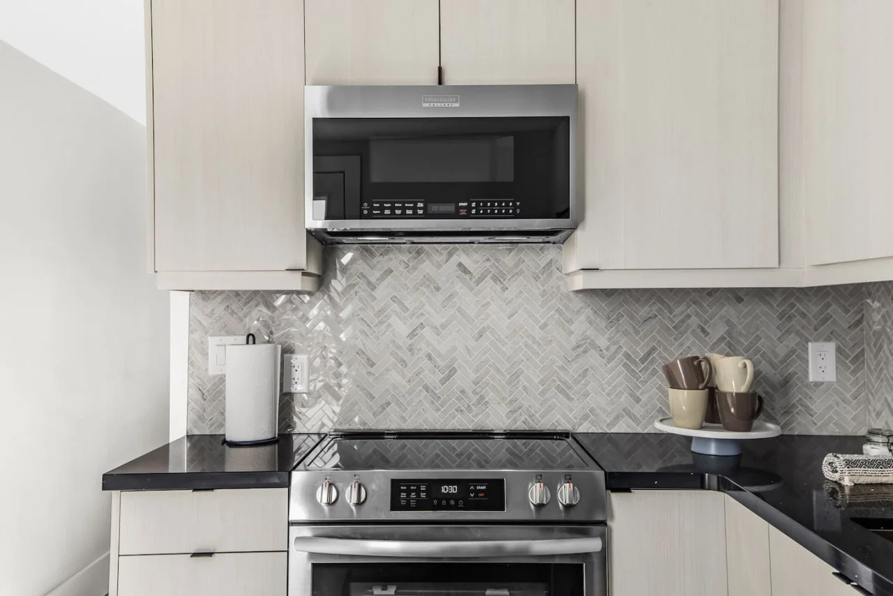 As you step into the kitchen, the clean lines and functional design make you eager to start cooking your favorite dishes.