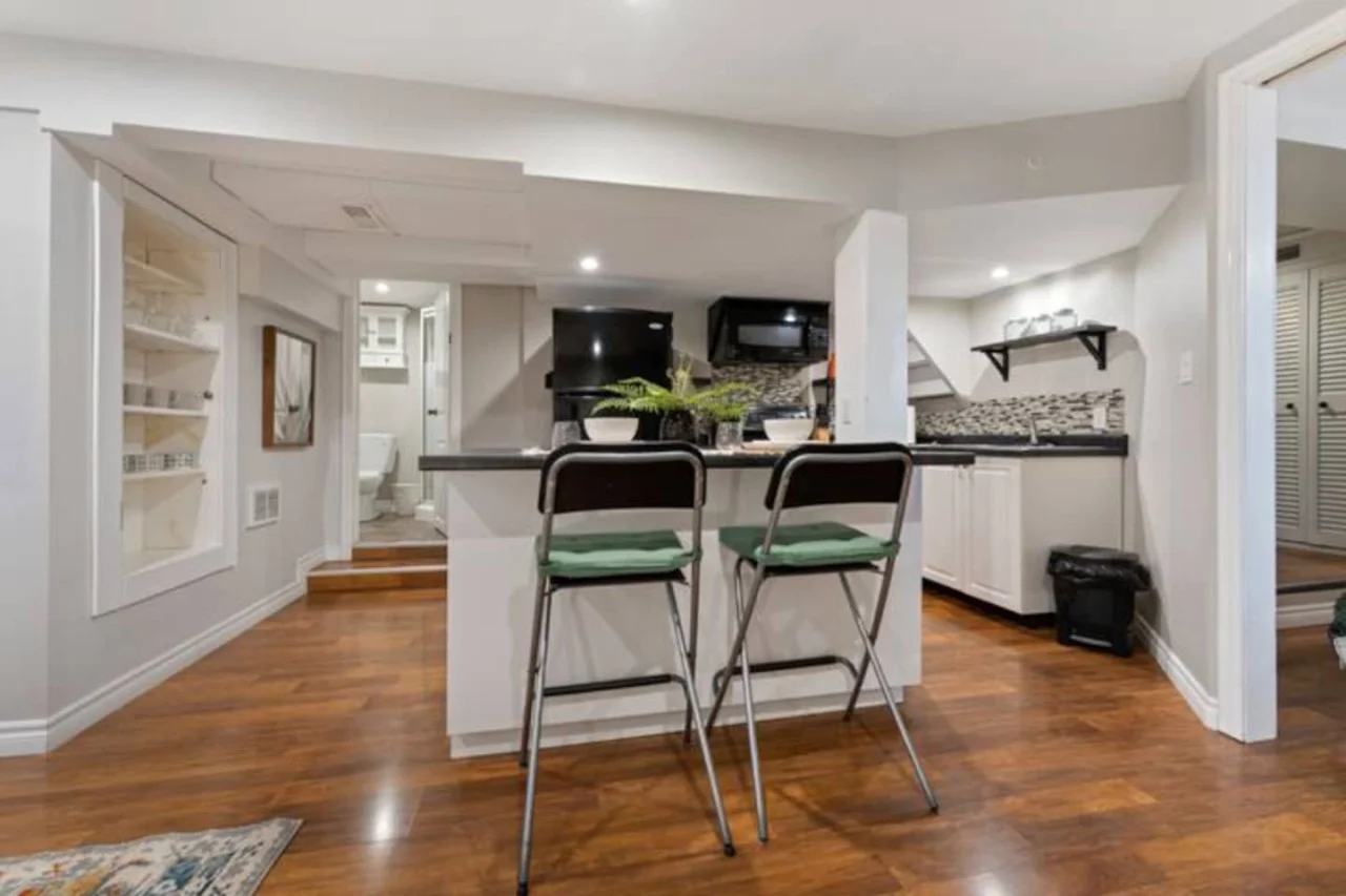 The dining room is bathed in natural light, creating a bright and inviting space where every meal feels special.