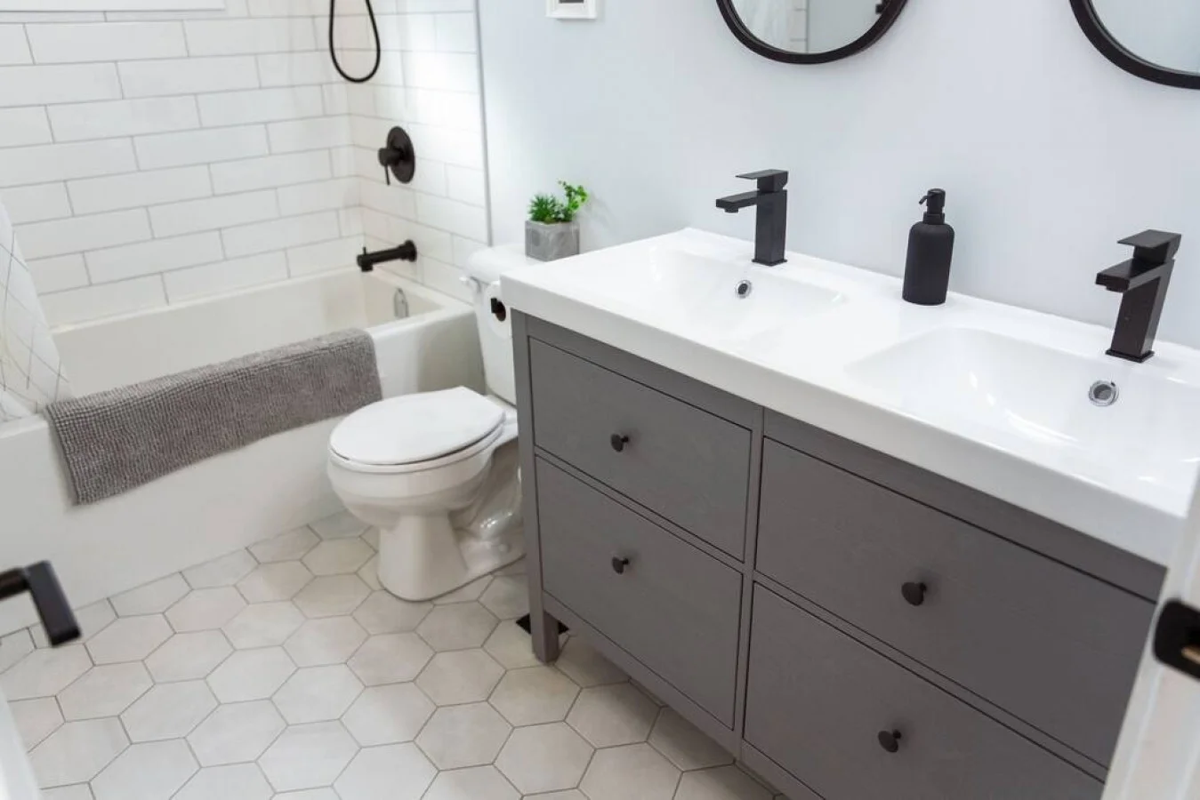 You feel a sense of calm as you enter the bathroom, where the thoughtful design and high-quality materials create a serene environment.