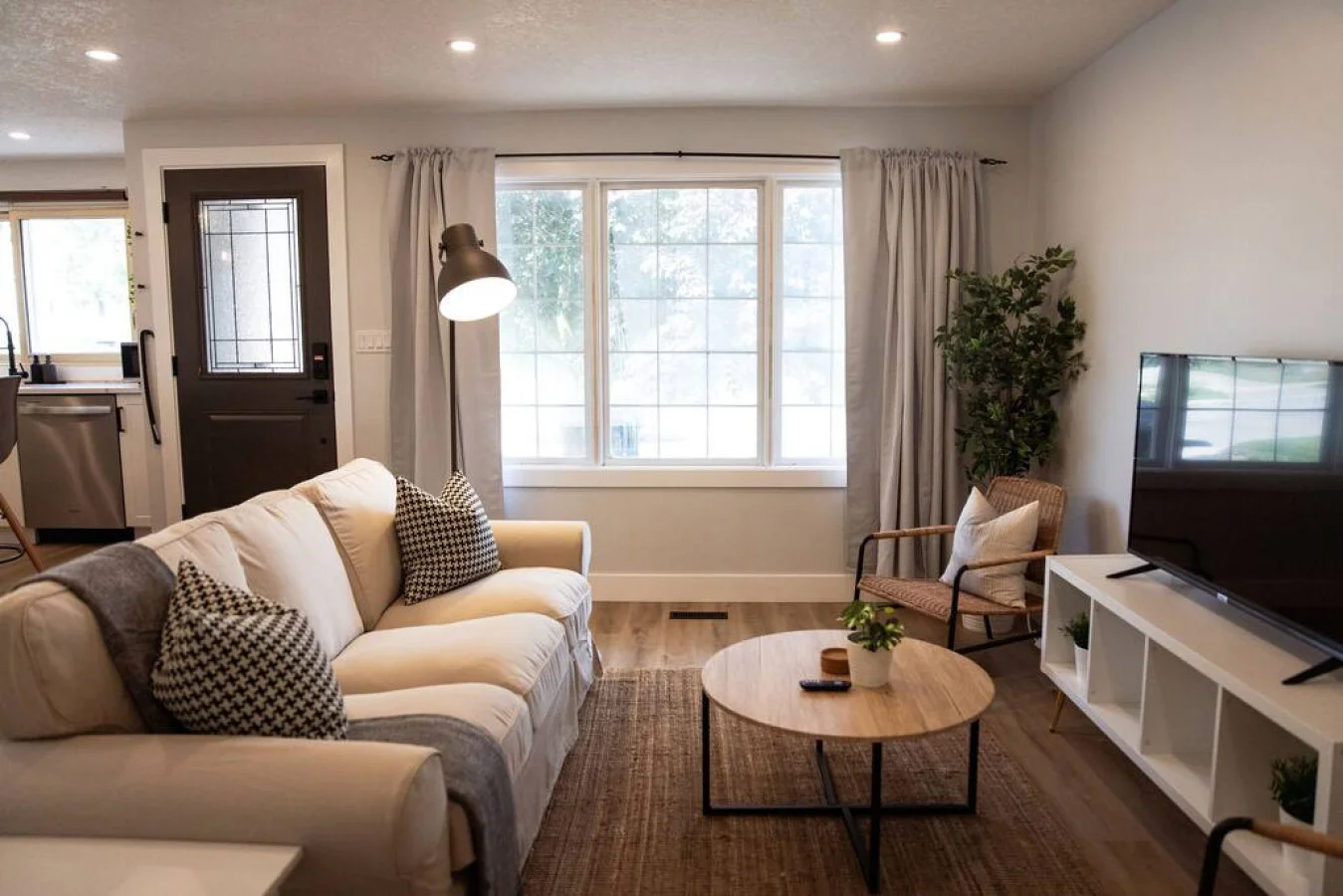 As you take a seat in the living room, the comfortable furniture and tasteful design make it easy to unwind.
