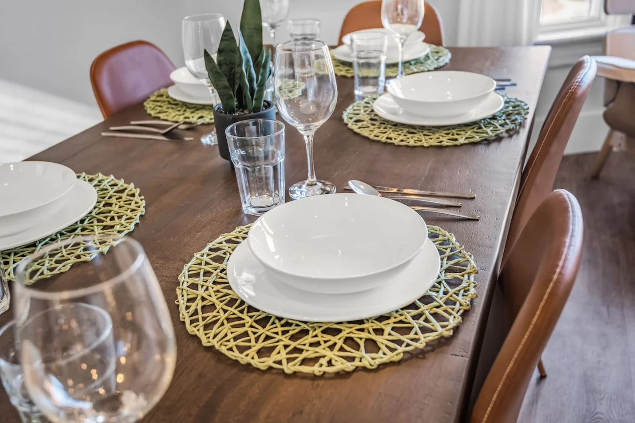 The dining room is bathed in natural light, creating a bright and inviting space where every meal feels special.