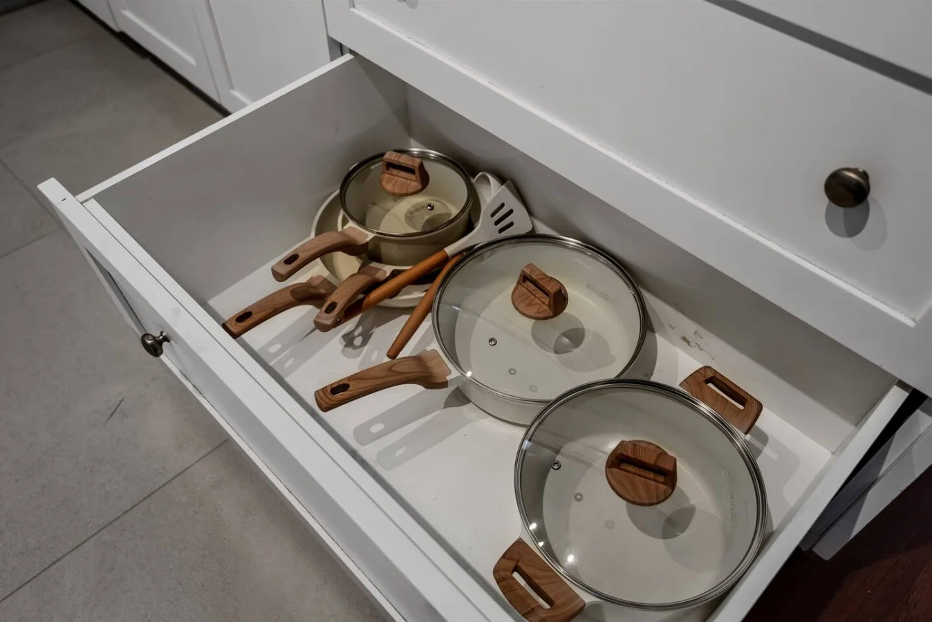 Cook with ease in this well-equipped kitchen featuring stainless steel appliances, ample cabinetry, and a stylish backsplash. Whether you're brewing coffee or preparing a gourmet meal, this space is designed for functionality and style, making every meal