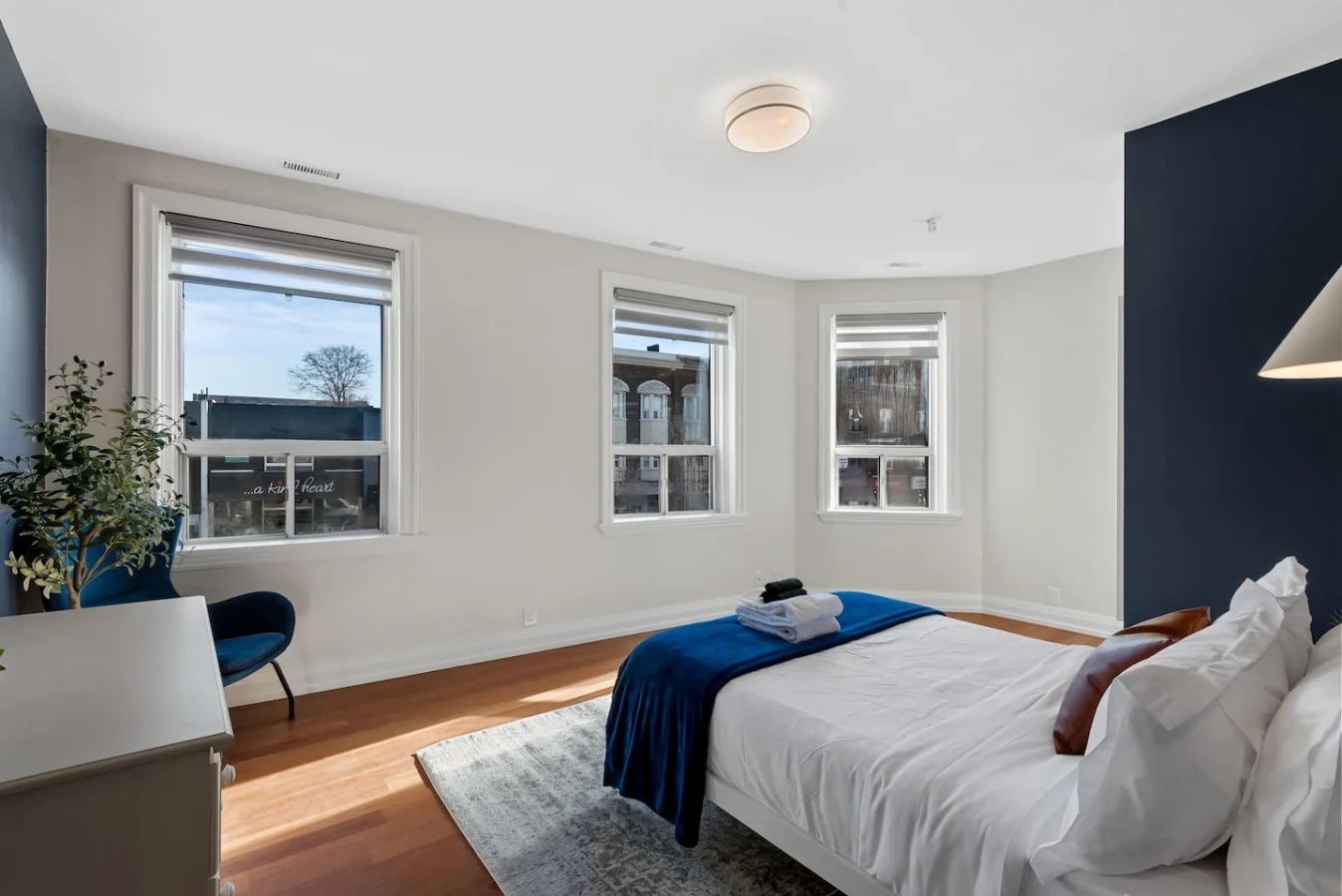 The bedroom’s serene ambiance invites you to relax, with a plush bed that promises a restful night's sleep.