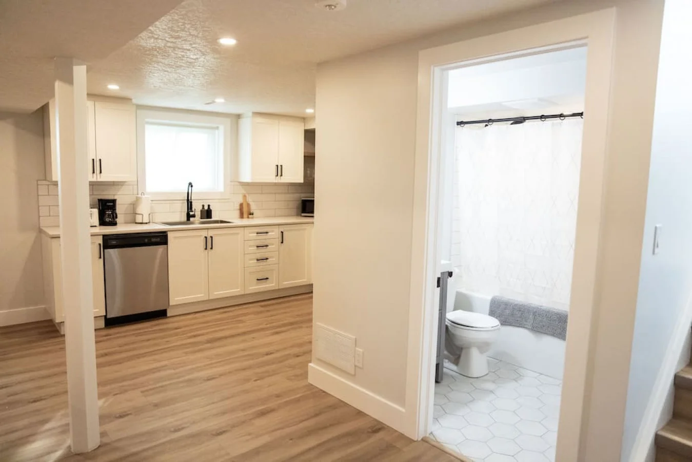 You feel a sense of calm as you enter the bathroom, where the thoughtful design and high-quality materials create a serene environment.