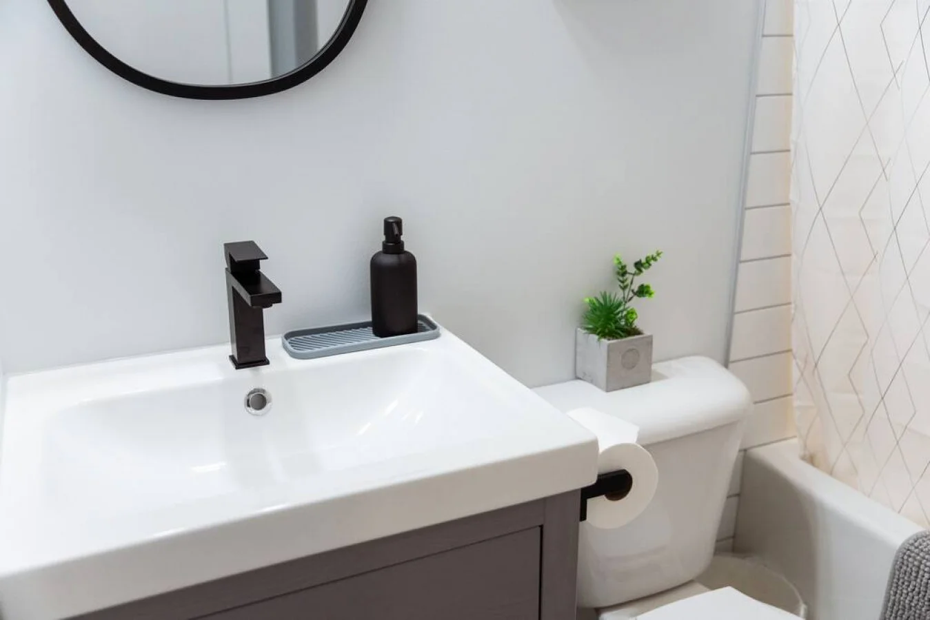 You feel a sense of calm as you enter the bathroom, where the thoughtful design and high-quality materials create a serene environment.