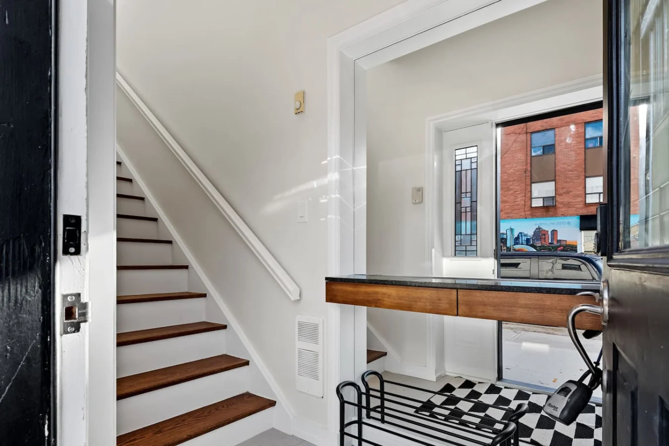 You feel a sense of continuity as you climb the stairs, moving seamlessly between the different levels of the home.