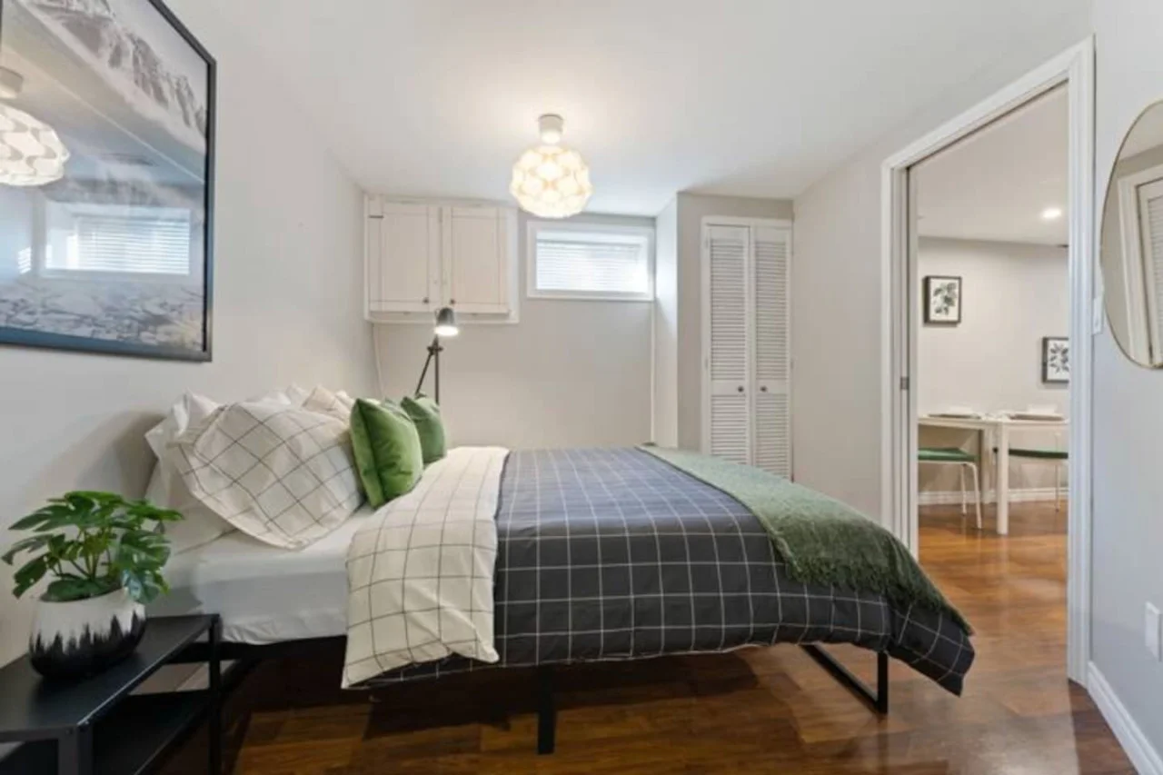 The bedroom’s serene ambiance invites you to relax, with a plush bed that promises a restful night's sleep.