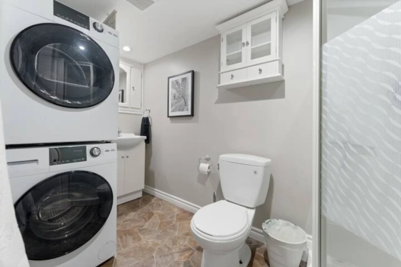 You feel a sense of calm as you enter the bathroom, where the thoughtful design and high-quality materials create a serene environment.
