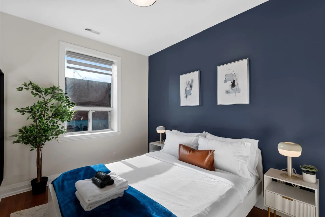 Spacious bedroom with stylish decor, perfect for unwinding after a day of exploring the local area.