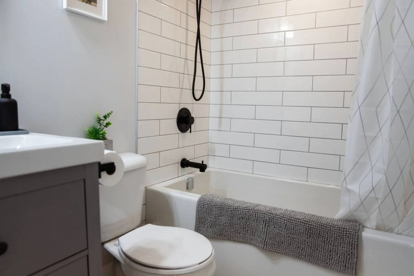As you step into the bathroom, the clean lines and soothing colors create a space where you can relax and refresh.