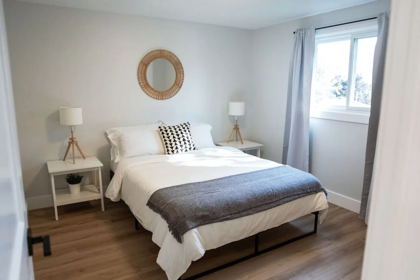 The bedroom’s serene ambiance invites you to relax, with a plush bed that promises a restful night's sleep.
