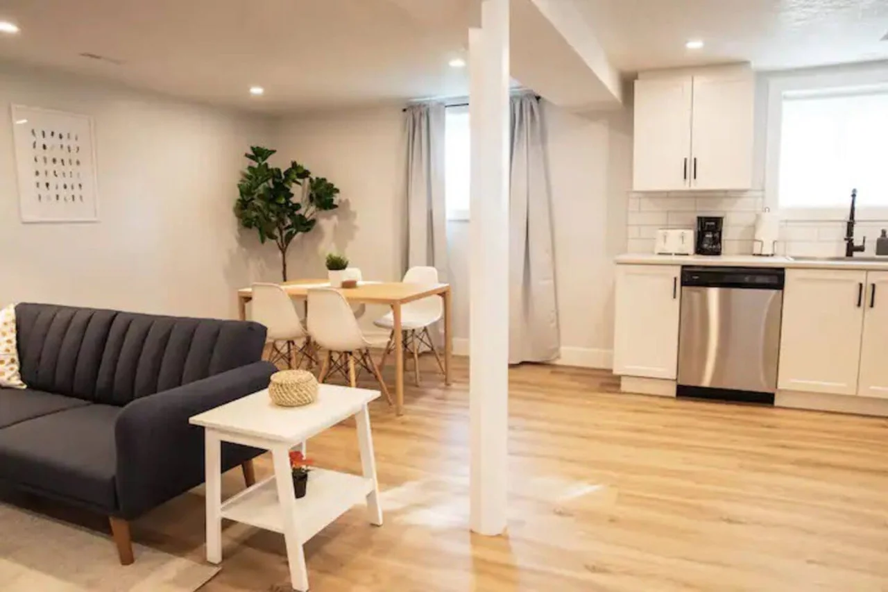An open-concept area featuring a modern furnishings, and a stylish entertainment setup—ideal for gatherings and relaxation.