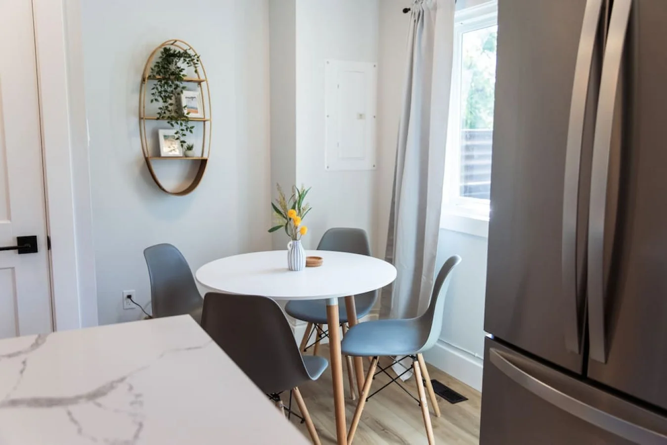 You are surrounded by tasteful decor and warm tones, making the dining room a perfect setting for any occasion.