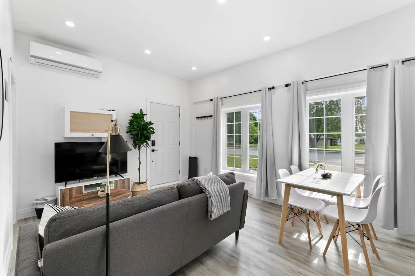Relax in the living room and watch your favorite shows, lounging is a great way to unwind after a long day.