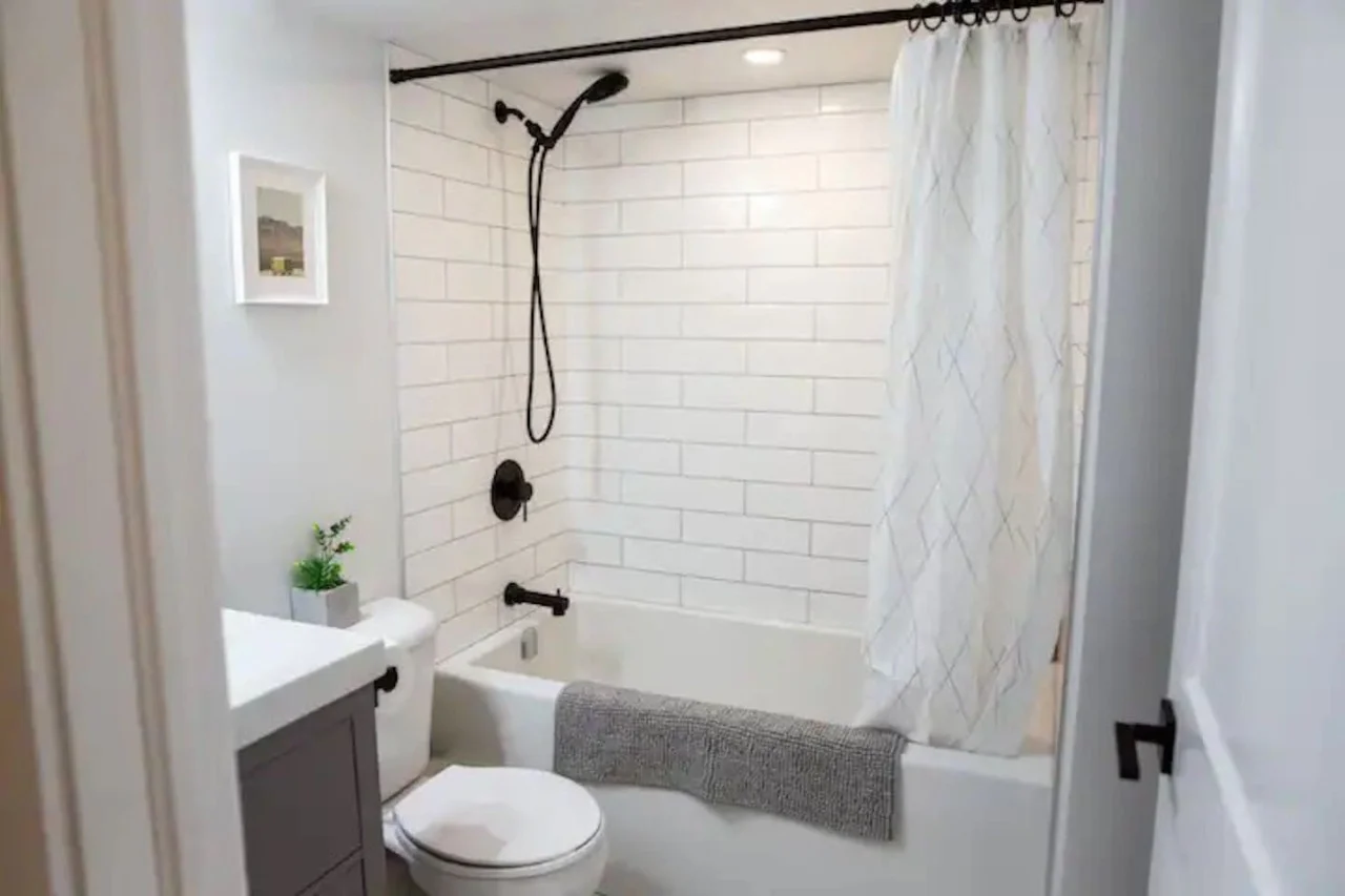 As you step into the bathroom, the clean lines and soothing colors create a space where you can relax and refresh.
