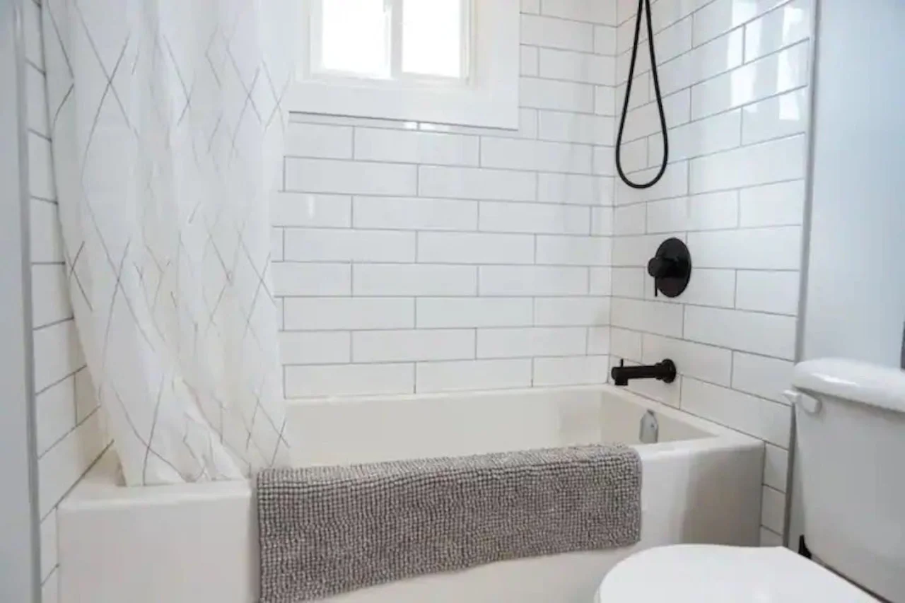You feel a sense of calm as you enter the bathroom, where the thoughtful design and high-quality materials create a serene environment.