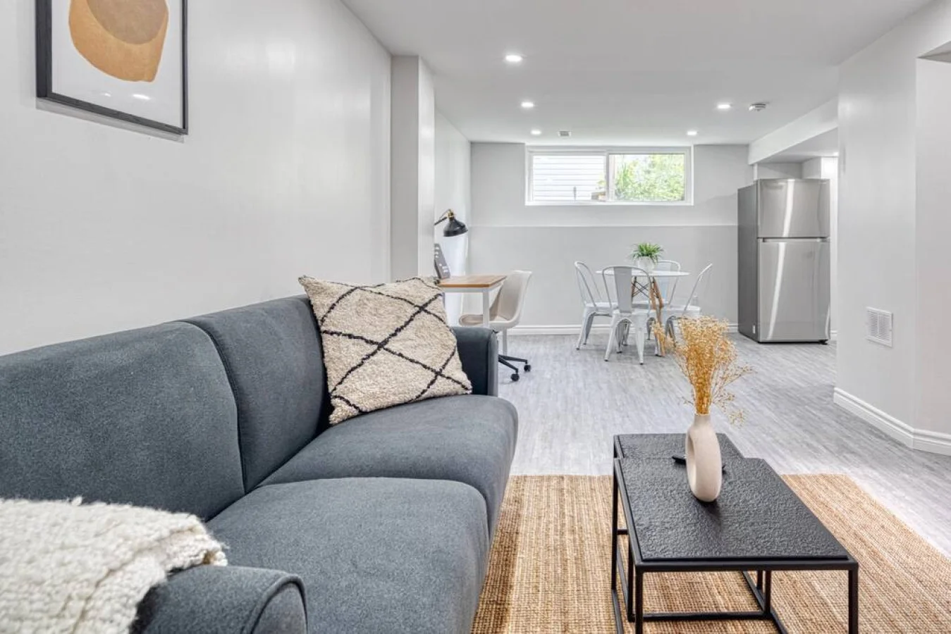 As you take a seat in the living room, the comfortable furniture and tasteful design make it easy to unwind.
