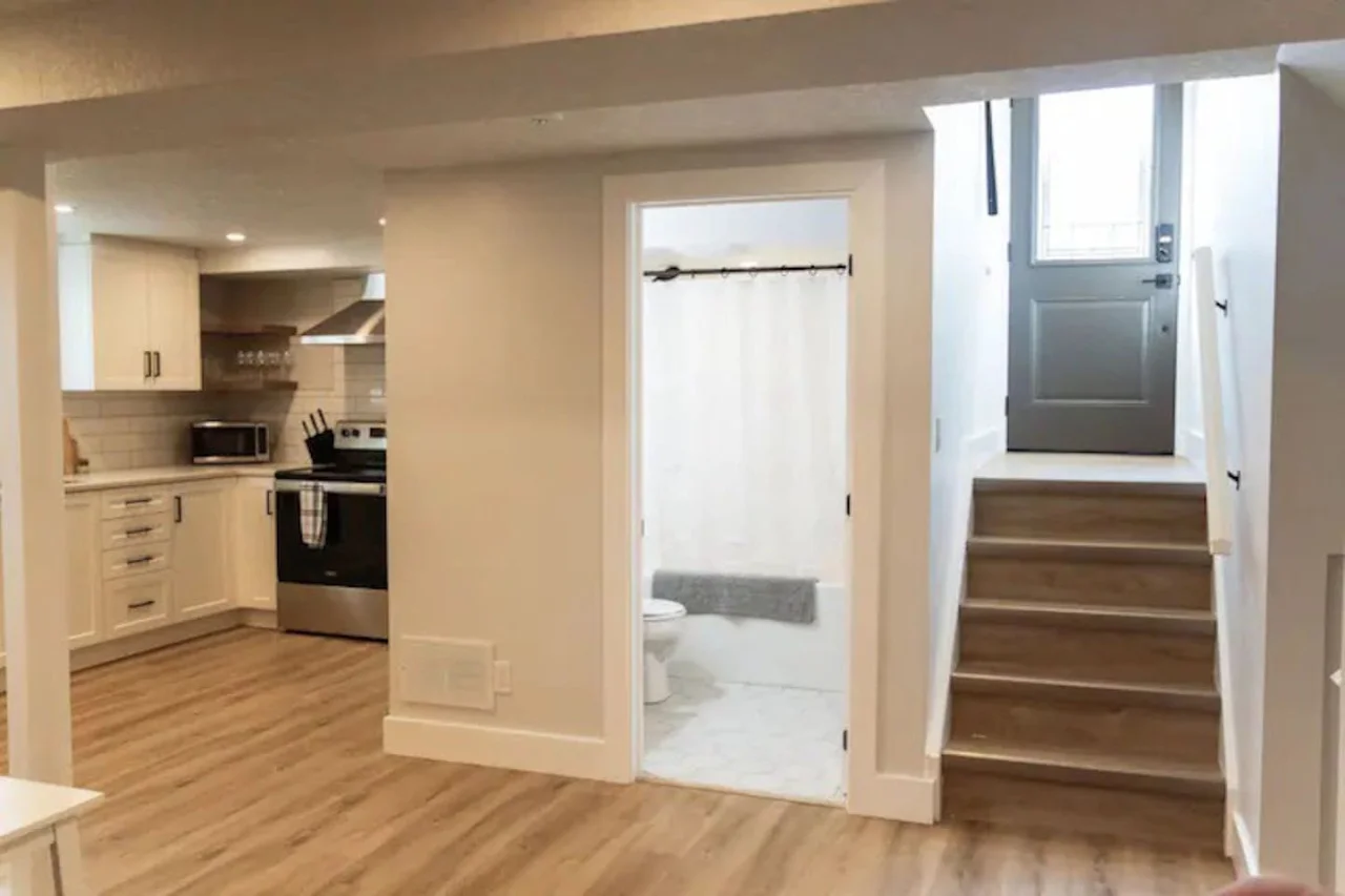 The stairs are both functional and beautiful, with a design that enhances the home’s aesthetic appeal.