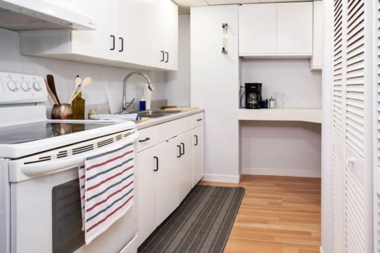 As you step into the kitchen, the clean lines and functional design make you eager to start cooking your favorite dishes.