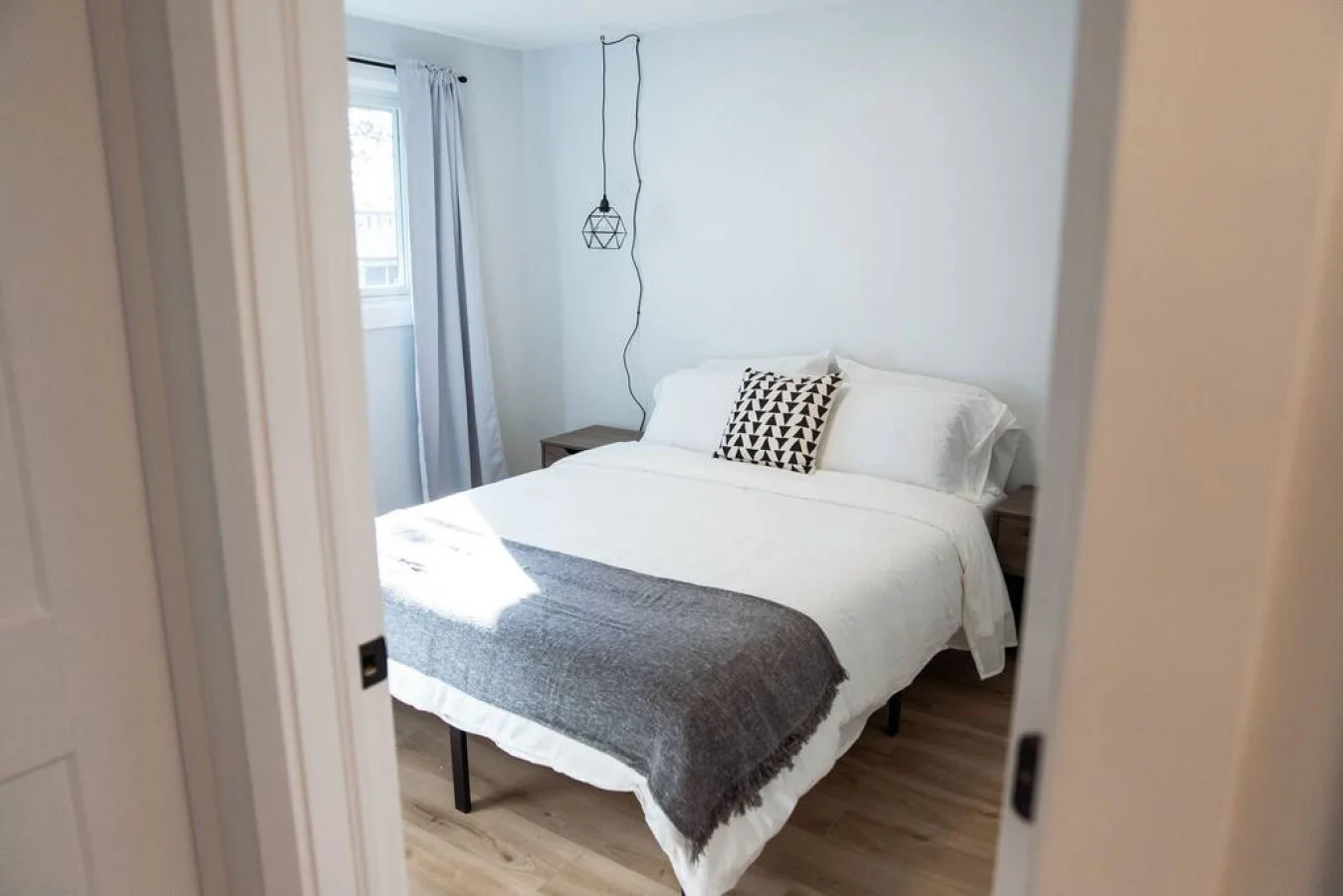 You’ll feel enveloped in warmth in this charming room with its rich wood accents and inviting bed. Wake up refreshed, surrounded by rustic coziness, and enjoy the perfect mix of comfort and natural vibes