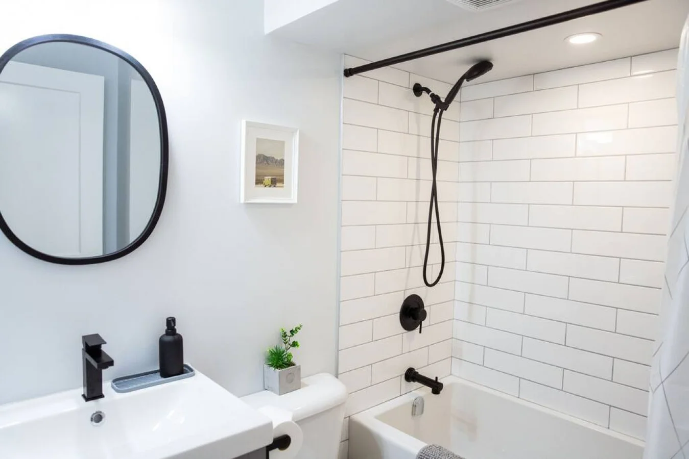 You feel a sense of calm as you enter the bathroom, where the thoughtful design and high-quality materials create a serene environment.