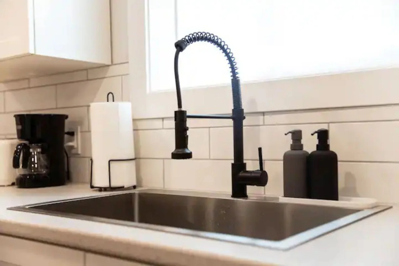 You can almost hear the sizzle of ingredients as you cook in the well-equipped kitchen, where every detail is designed for convenience.