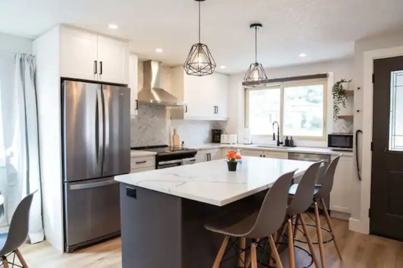 Elegant dining area with a large table and comfortable seating, perfect for gathering with family and friends for a meal.