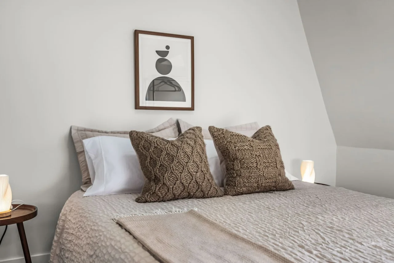 As you lie back on the queen bed, you are surrounded by elegant decor and a soothing color palette that calms the senses.
