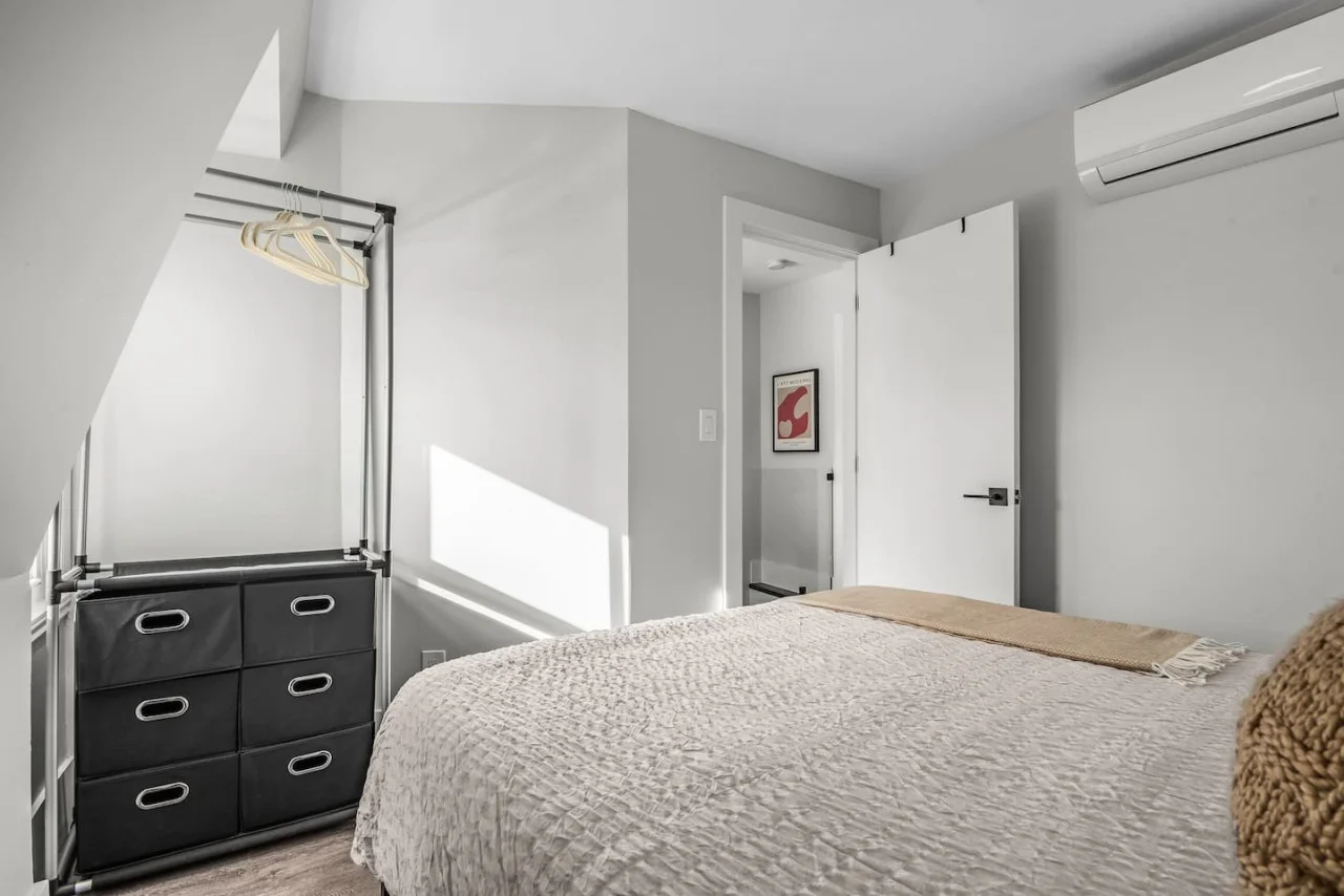 The bedroom offers a sanctuary of calm, where you can unwind and recharge in comfort and style.