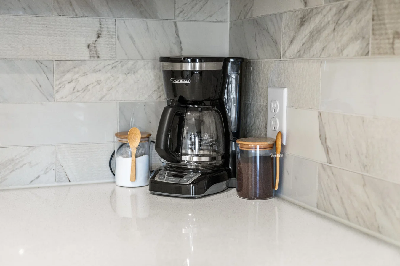 Start your mornings with fresh coffee—everything you need is ready on the countertop.