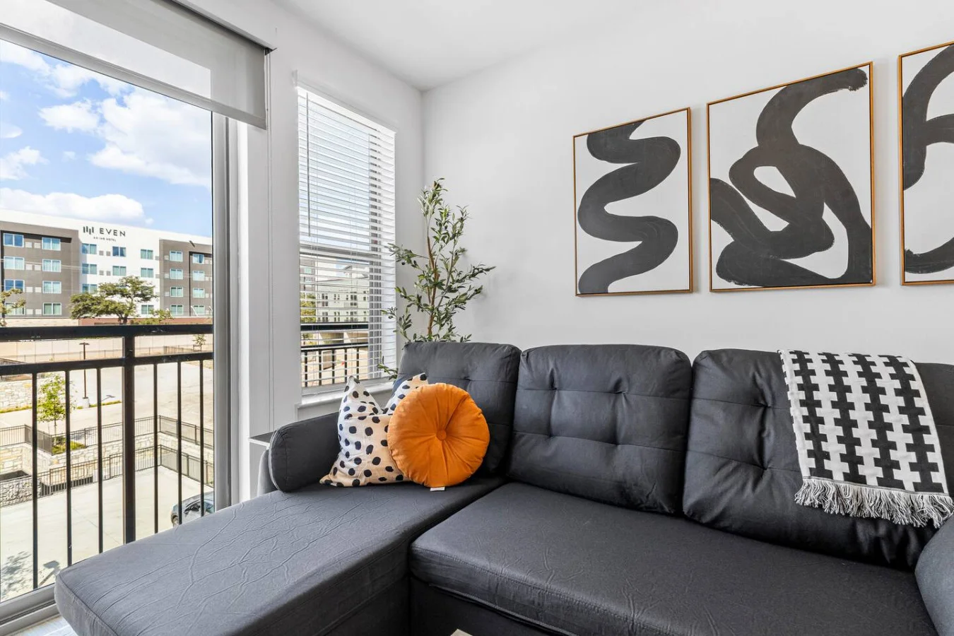 Take a seat in the living room, where cozy furniture and tasteful design create a relaxing atmosphere.
